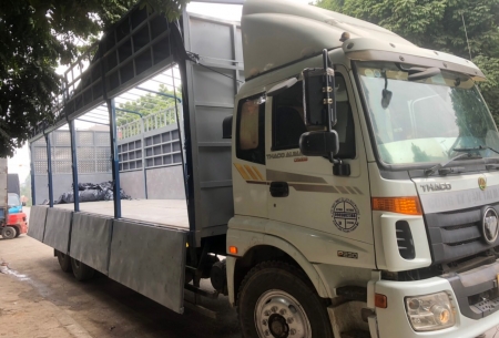 Nhận Vận chuyển hàng hóa với xe thùng bạt dài 9m7 mở sườn 
